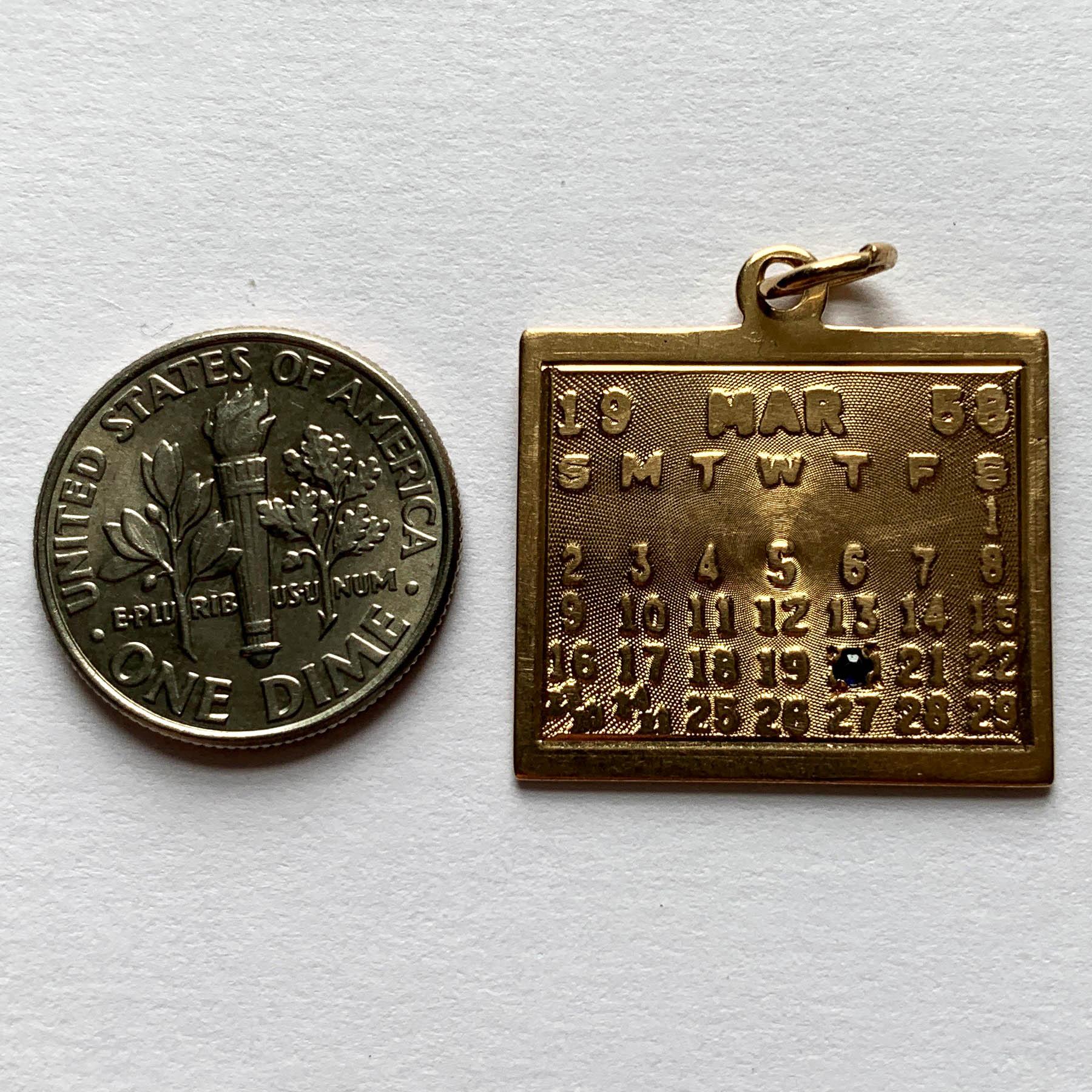 Yellow Gold Blue Sapphire 20th March 1958 Calendar Date Charm Pendant In Good Condition In London, GB