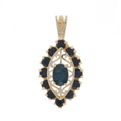 Yellow Gold Blue Sapphire Halo Pendant - 10k Oval 2.92ctw