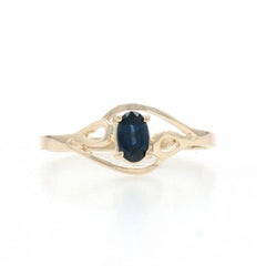 Yellow Gold Blue Sapphire Solitaire Bypass Ring - 10k Oval .26ct