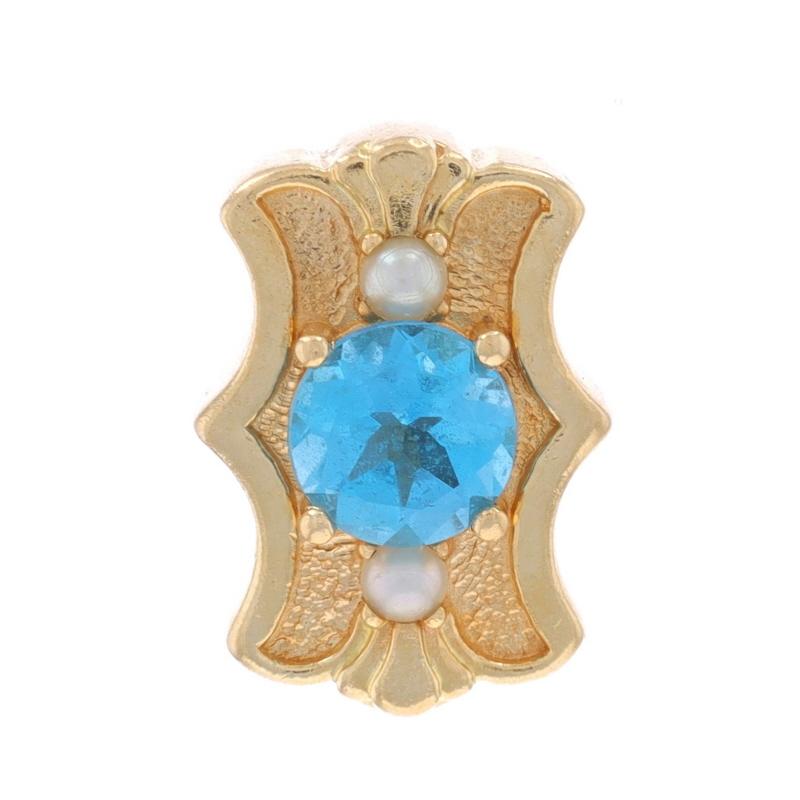 Era: Vintage

Metal Content: 14k Yellow Gold

Stone Information

Natural Topaz
Carat(s): 1.00ct
Cut: Round
Color: Blue

Cultured Pearls
Color: White

Total Carats: 1.00ct

Style: Slide Charm

Measurements

Tall: 5/8