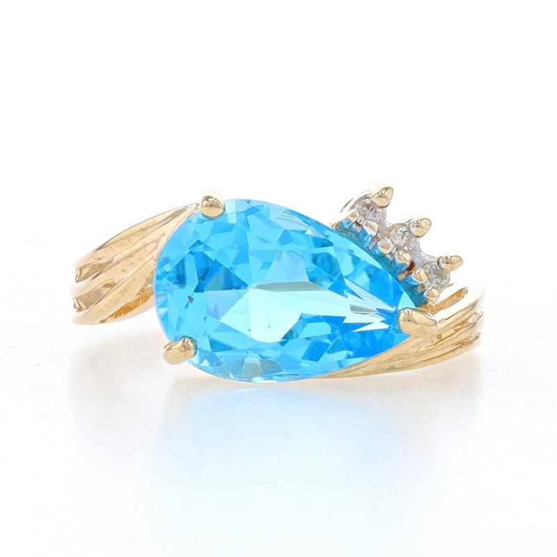 Bypass-Ring aus Gelbgold mit blauem Topas und Diamanten - 14k Birne 6,53 ctw Ost-West