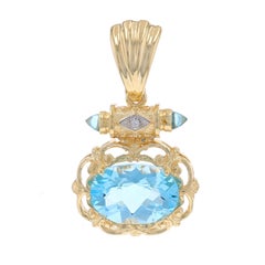 Colgante de oro amarillo con topacio azul y diamantes 14k damero oval 9.15ctw