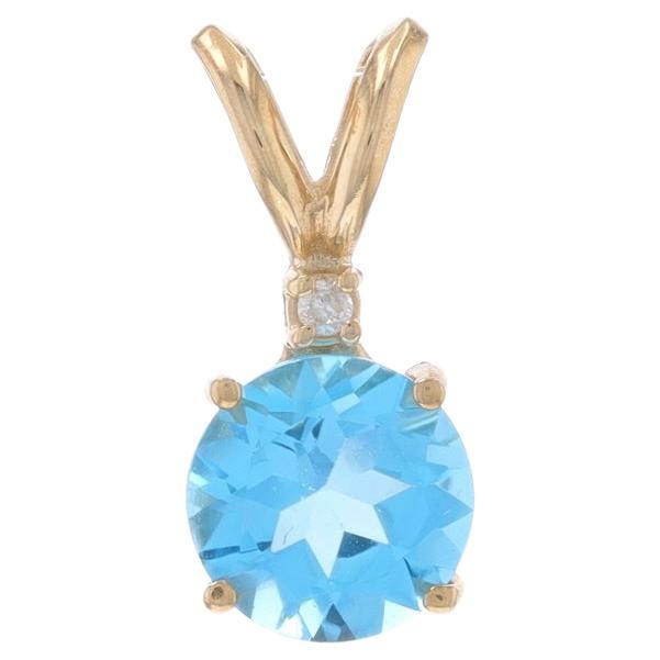 Colgante de Oro Amarillo Topacio Azul y Diamante - 10k Redondo 1.56ct
