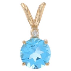 Colgante de Oro Amarillo Topacio Azul y Diamante - 10k Redondo 1.56ct