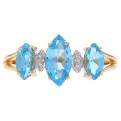 Gelbgold Blauer Topas & Diamantring - 10k Marquise 1,30ctw Drei-Stein-Ring