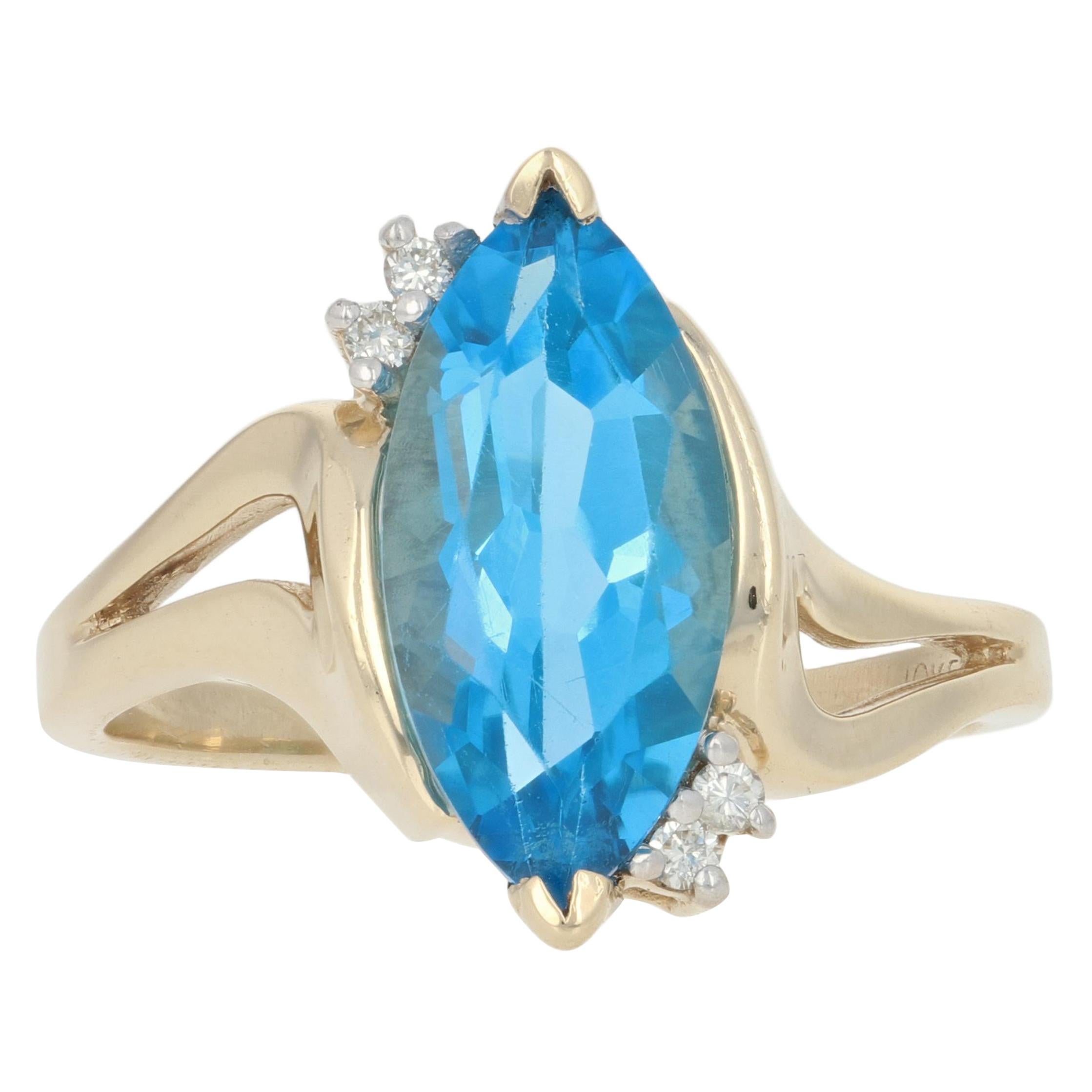 Yellow Gold Blue Topaz & Diamond Ring, 10k Marquise Cut 3.44ctw Bypass