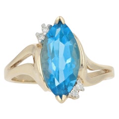 Yellow Gold Blue Topaz & Diamond Ring, 10k Marquise Cut 3.44ctw Bypass