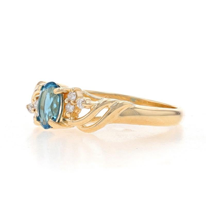 Yellow Gold Blue Topaz & Diamond Ring - 10k Oval .55ctw In Excellent Condition For Sale In Greensboro, NC