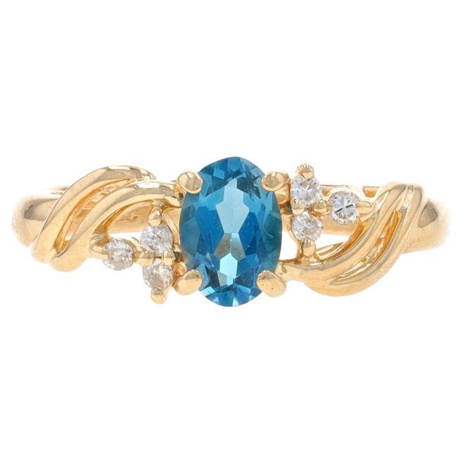 Yellow Gold Blue Topaz & Diamond Ring - 10k Oval .55ctw For Sale
