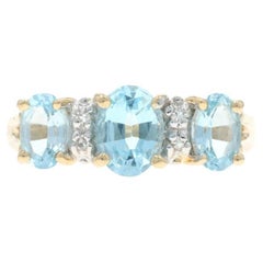 Anello in oro giallo con diamante Topazio Blu 14k Ovale 2,26ctw Tre pietre