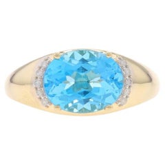 Bague en or jaune 14 carats avec topaze bleue et diamants, 3,58 ctw Est-Ouest