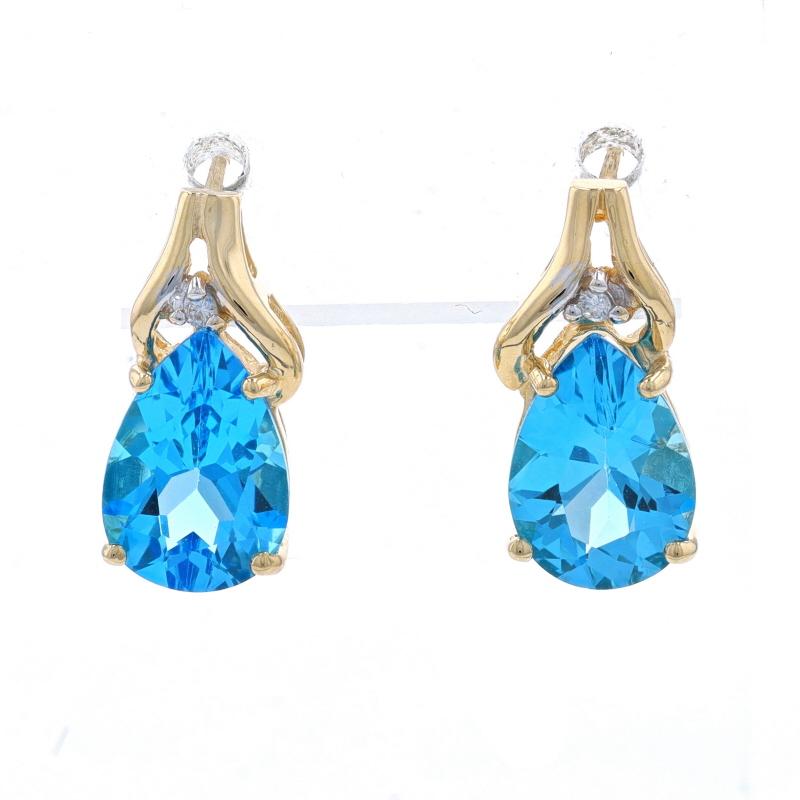 Metal Content: 14k Yellow Gold & 14k White Gold

Stone Information

Natural Blue Topaz
Treatment: Routinely Enhanced
Carat(s): 7.00ctw
Cut: Pear

Natural Diamonds
Cut: Round Brilliant
Stone Note: (two small accents)

Total Carats: 7.00ctw

Style: