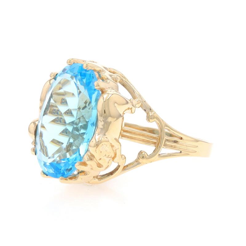 Yellow Gold Blue Topaz Elephant Cocktail Solitaire Ring - 10k Oval 12.40ct In Excellent Condition For Sale In Greensboro, NC