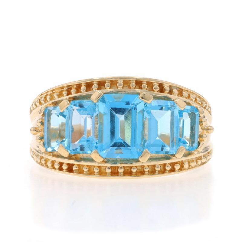 Size: 9

Metal Content: 10k Yellow Gold

Stone Information

Natural Blue Topaz
Treatment: Routinely Enhanced
Carat(s): 3.04ctw
Cut: Emerald

Total Carats: 3.04ctw

Style: Graduated Five-Stone

Measurements

Face Height (north to south): 15/32