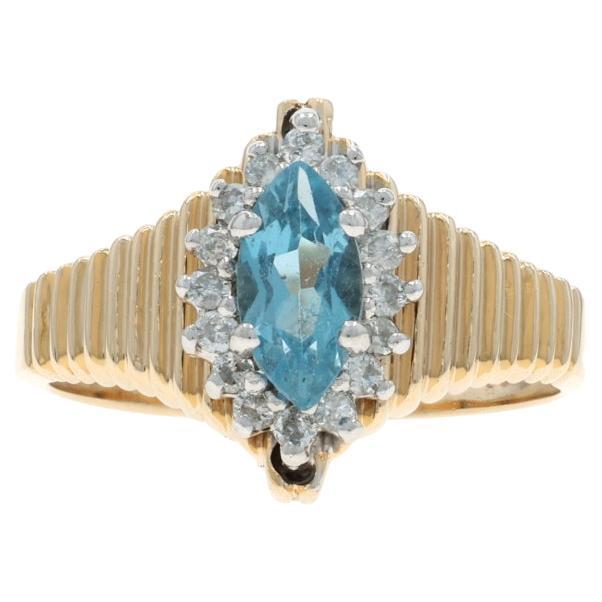 Yellow Gold Blue Topaz Halo Ring - 14k Marquise .85ctw en vente