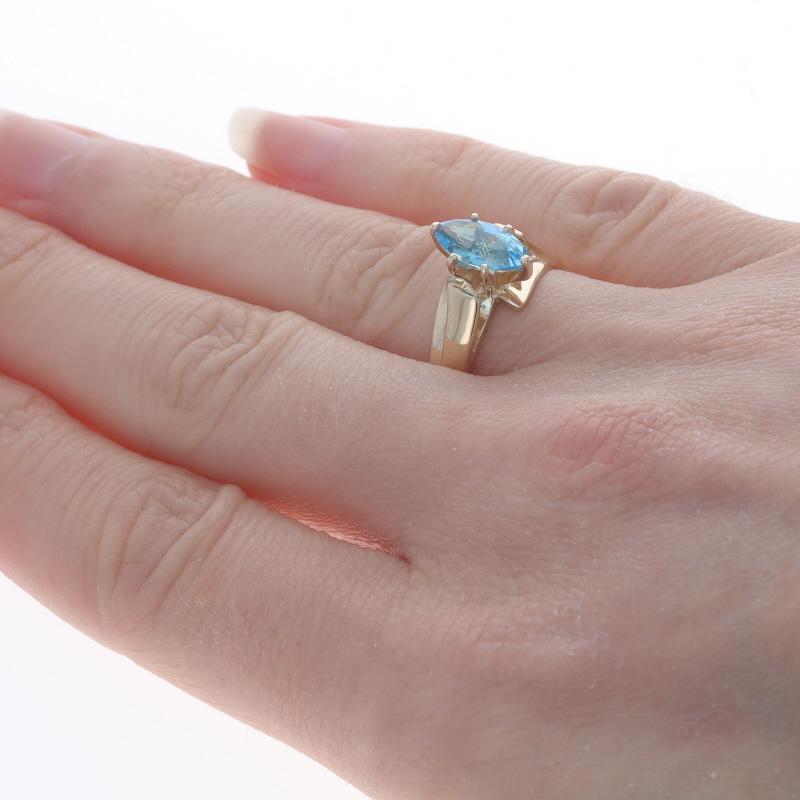 Yellow Gold Blue Topaz Solitaire Bypass Ring - 10k Marquise 1.20ct In Excellent Condition For Sale In Greensboro, NC