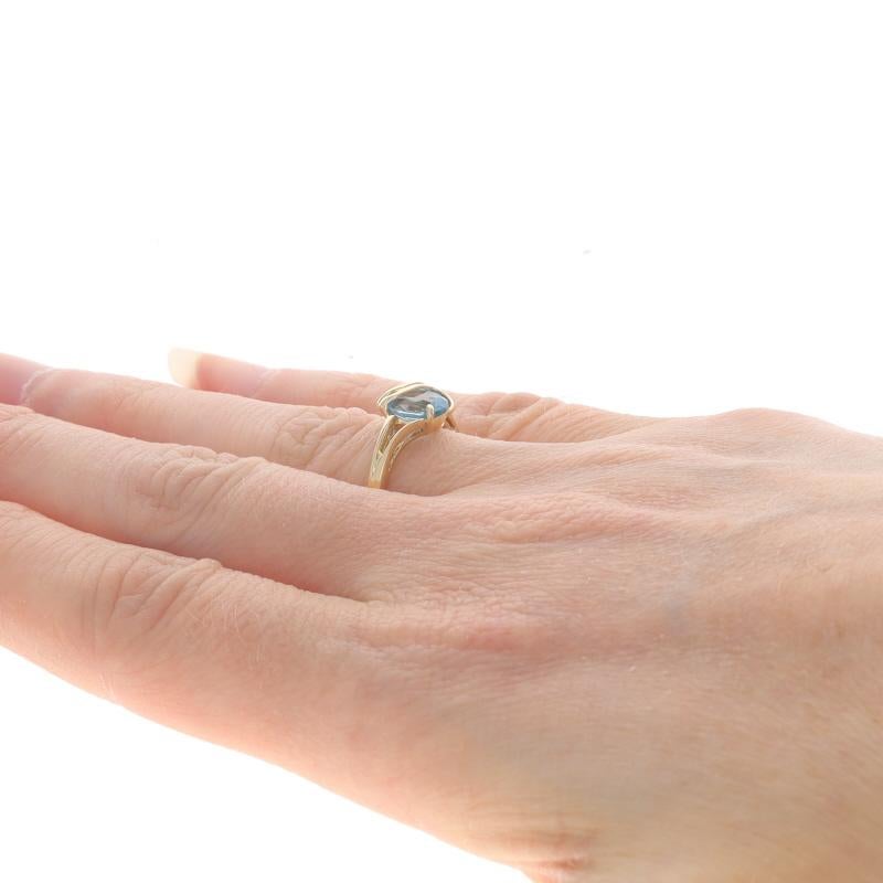 Women's Yellow Gold Blue Topaz Solitaire Bypass Ring - 10k Oval 1.60ct