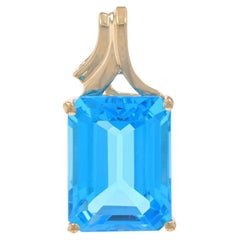 Yellow Gold Blue Topaz Solitaire Pendant - 10k Emerald Cut 12.89ct