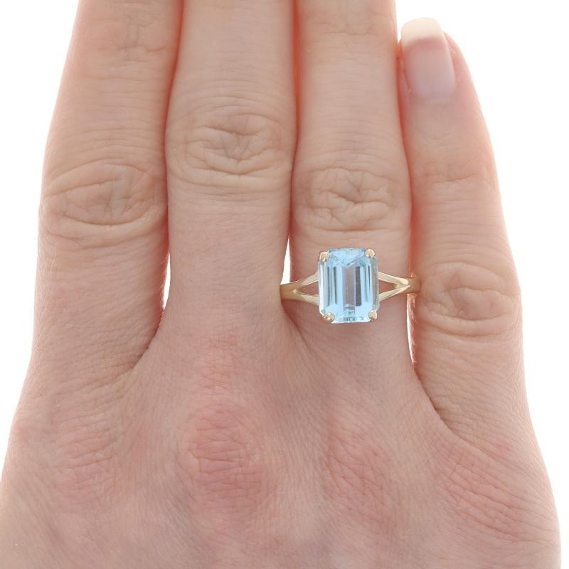 Size: 7 1/2
Sizing Fee: Up 2 sizes for $35 or Down 3 sizes for $30

Metal Content: 14k Yellow Gold

Stone Information

Natural Blue Topaz
Treatment: Routinely Enhanced
Carat(s): 3.75ct
Cut: Emerald

Total Carats: 3.75ct

Style: Solitaire
Features: