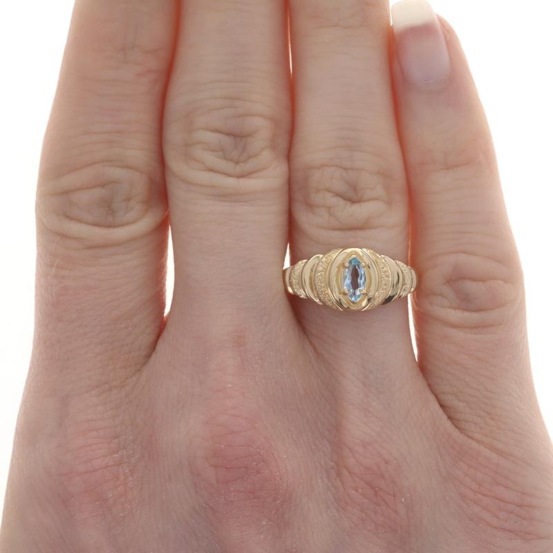 Size: 6 1/2
Sizing Fee: Up 2 sizes for $35 or Down 3 sizes for $30

Metal Content: 14k Yellow Gold

Stone Information

Natural Blue Topaz
Treatment: Routinely Enhanced
Carat(s): .30ct
Cut: Marquise

Total Carats: .30ct

Style: Solitaire
Features: