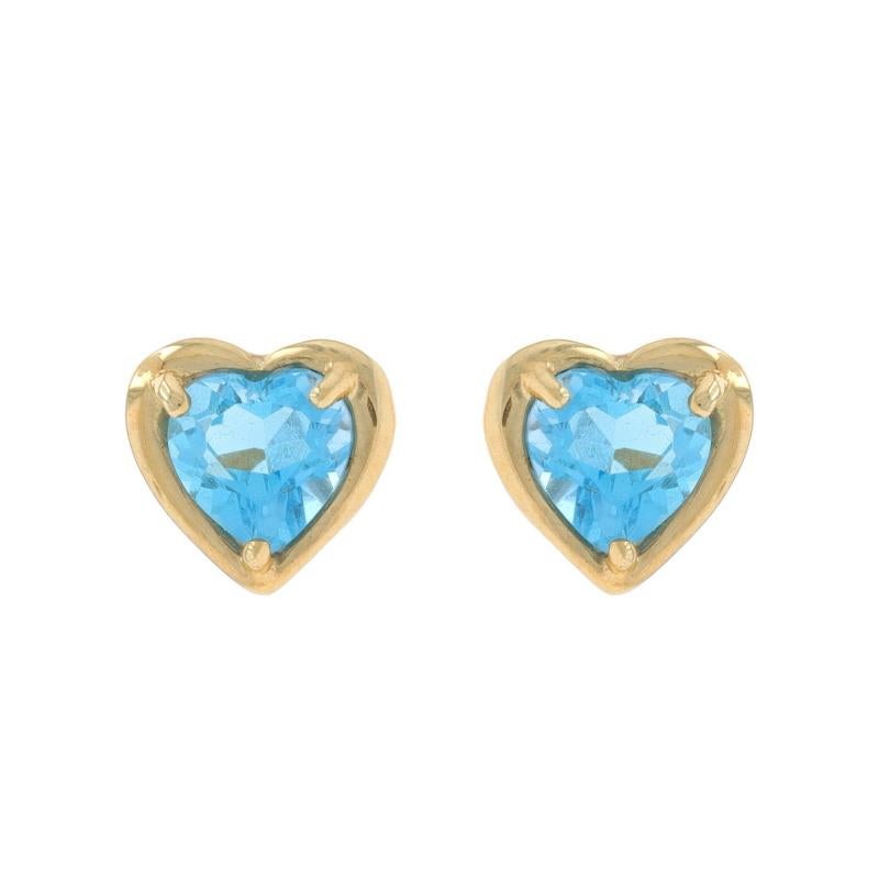 Metal Content: 10k Yellow Gold

Stone Information

Natural Topaz
Treatment: Routinely Enhanced
Carat(s): 1.50ctw
Cut: Heart
Color: Blue

Total Carats: 1.50ctw

Style: Stud
Fastening Type: Butterfly Closures
Theme: Love, Hearts

Measurements

Tall: