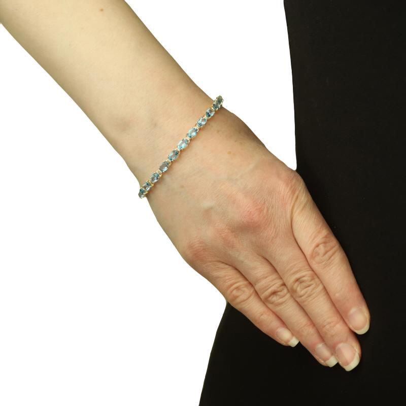 Oval Cut Yellow Gold Blue Topaz Tennis Bracelet 6 3/4