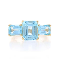 Yellow Gold Blue Topaz Three-Stone Ring 10k Emerald 5.90ctw