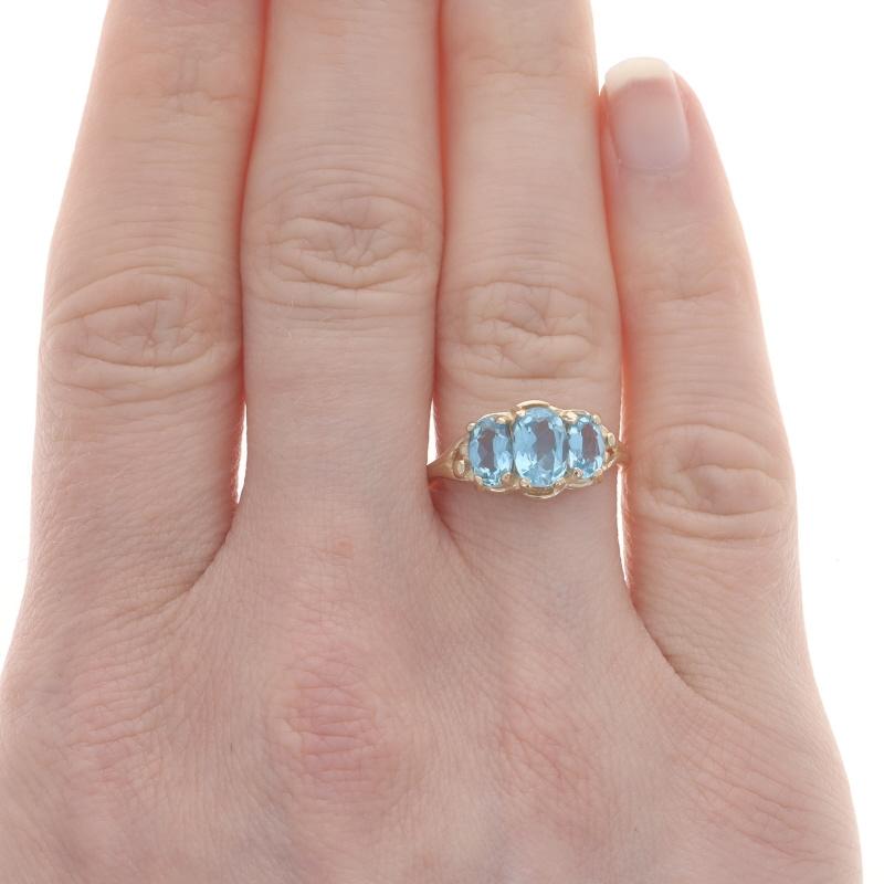 Size: 6 3/4
Sizing Fee: Up 2 sizes for $30 or Down 2 sizes for $30

Metal Content: 10k Yellow Gold

Stone Information

Natural Blue Topaz
Treatment: Routinely Enhanced
Carat(s): 1.95ctw
Cut: Oval

Total Carats: 1.95ctw

Style: