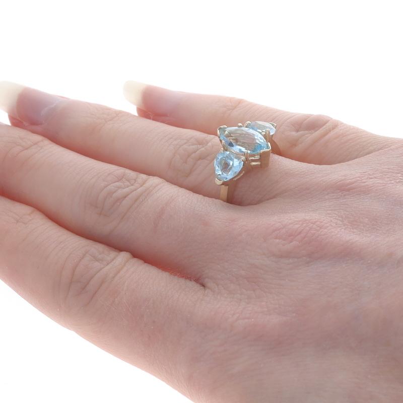 Women's Yellow Gold Blue Topaz Three-Stone Ring - 14k Marquise & Trillion 3.24ctw For Sale