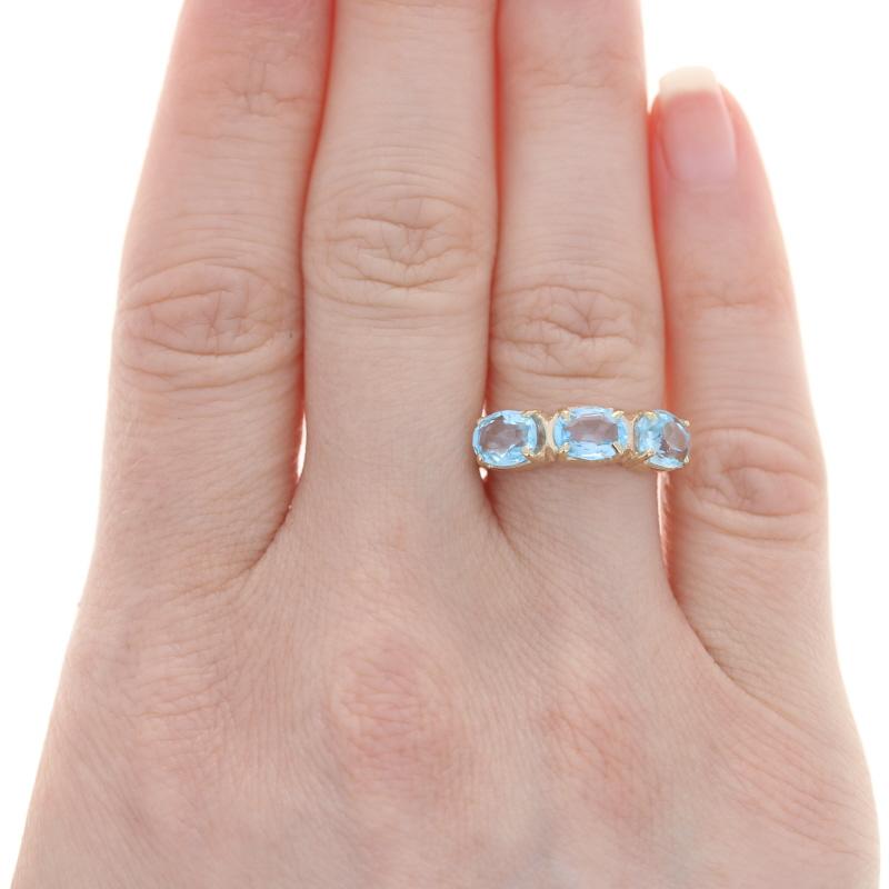 Oval Cut Yellow Gold Blue Topaz Three-Stone Ring - 14k Oval 3.60ctw East-West Set For Sale