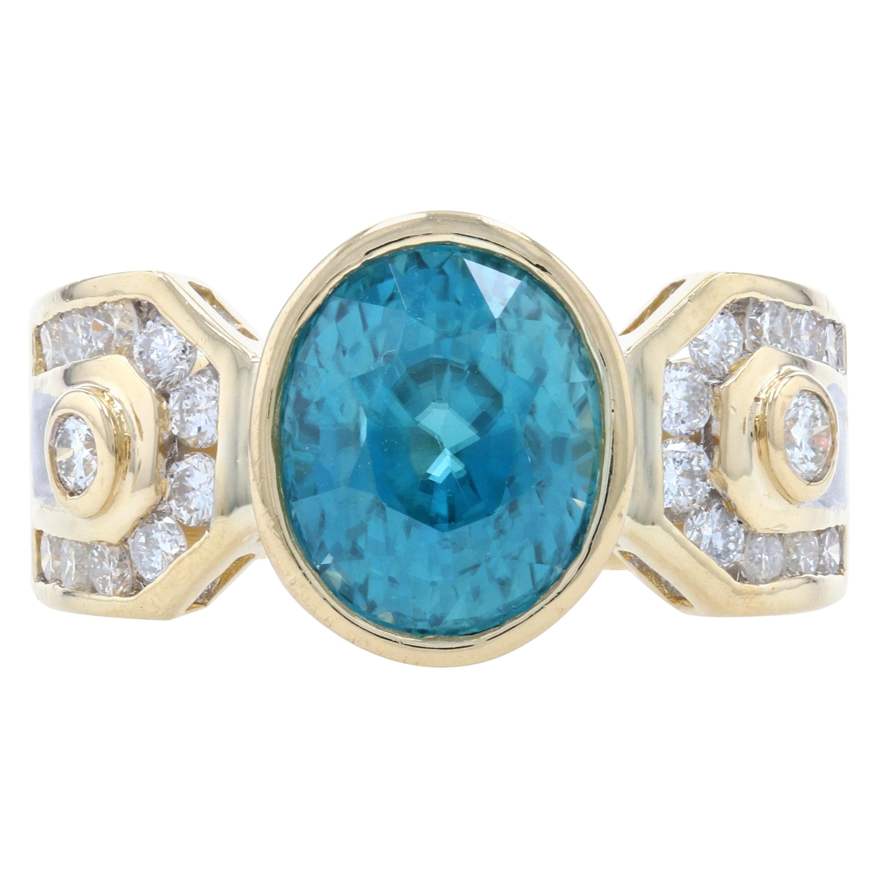 Ring aus Gelbgold mit blauem Zirkon und Diamant im Ovalschliff, 18 Karat, 6,30 Karat