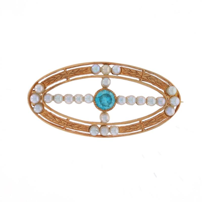 Epoche: Edwardian

Metallgehalt: 14k Gelbgold

Informationen zu Stein

Natürlicher blauer Zirkon
Karat(e): .30ct
Schnitt: Rund

Saatgut-Perlen

Karat gesamt: .30ct

Merkmale: Geätzte Detaillierung

Messungen

Hoch: 21/32