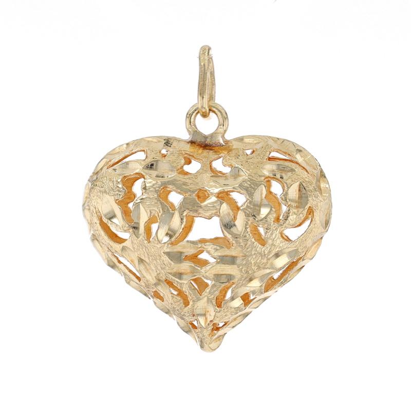 Metal Content: 14k Yellow Gold

Theme: Botanical Puffy Heart, Love
Features: Open Cut Design with Etched Detailing

Measurements

Tall (from stationary bail): 31/32