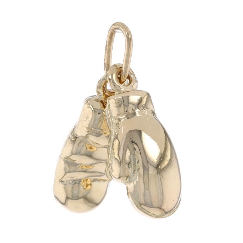 Metal Content: 14k Yellow Gold

Theme: Boxing Gloves, Boxing, Sports 
Features: Hollow construction

Measurements
Tall (from stationary bails): 23/32