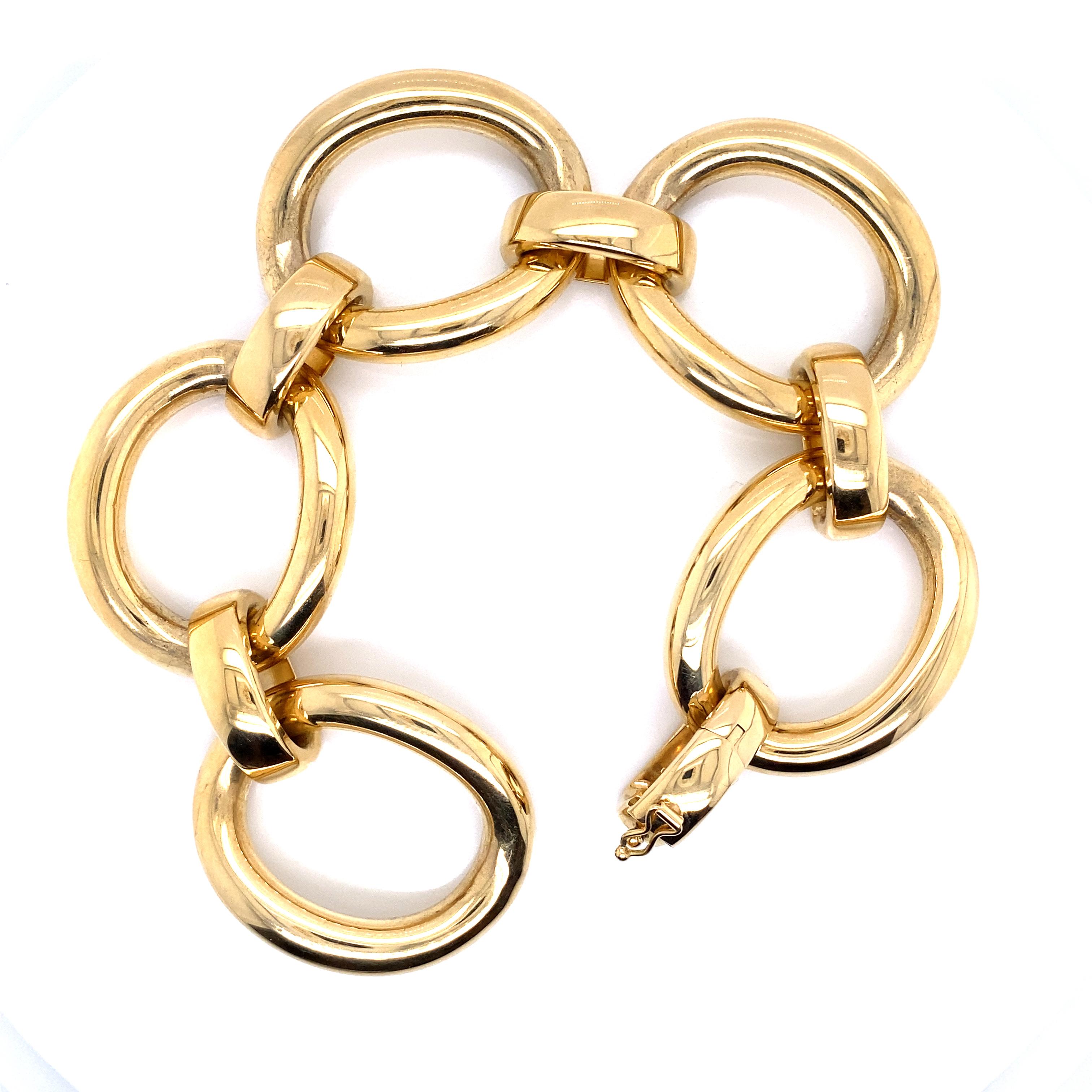 Yellow Gold Bracelet Accompanied by Oval Links with Gadroons
The weight of the gold is 58.71 grams.


Go to our showcase page for more updates and click on the 