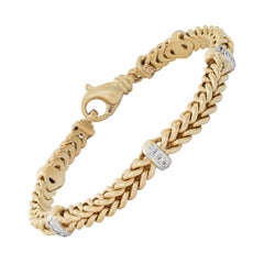 Yellow gold bracelet with diamond stations