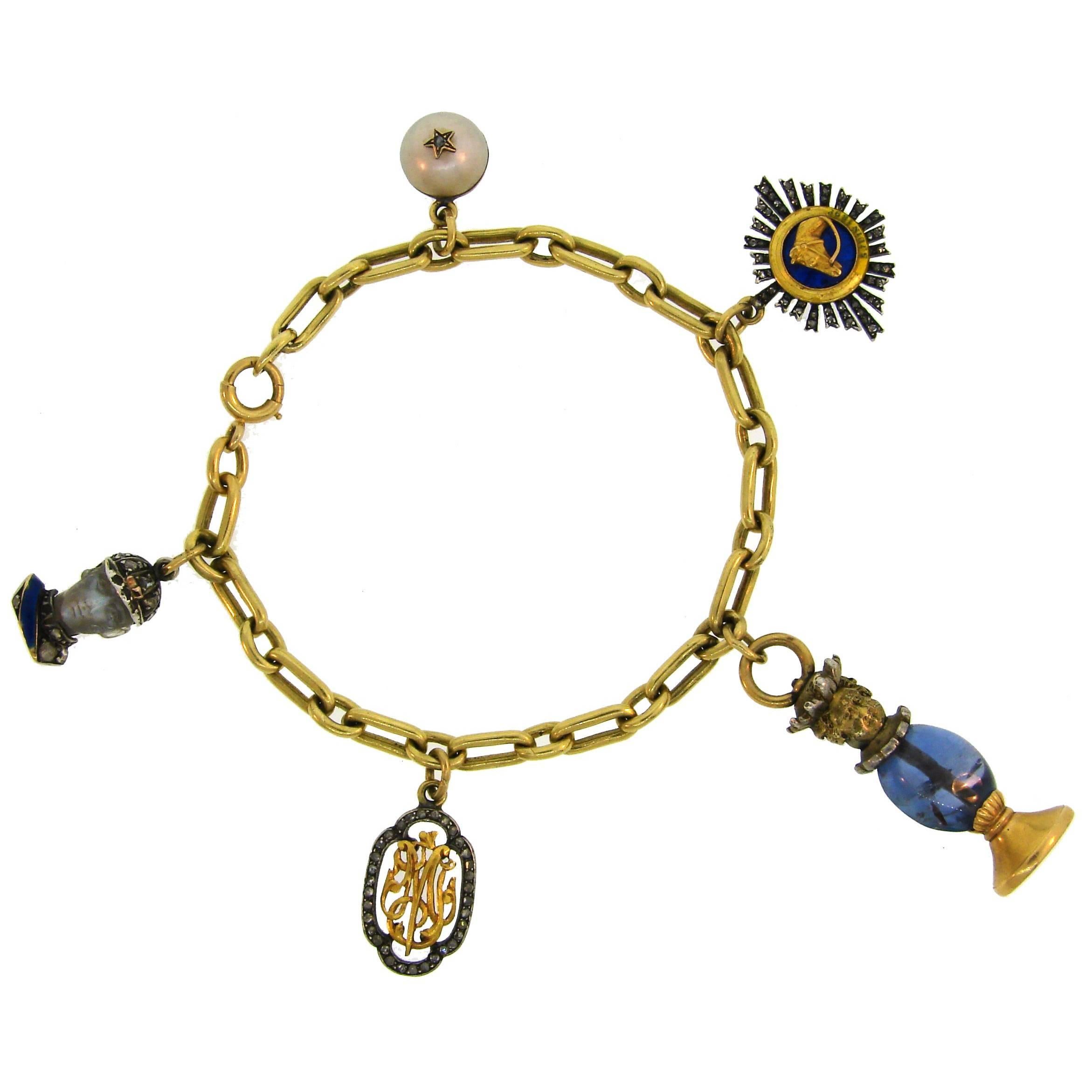 Yellow Gold Bracelet with Victorian Diamond Enamel Sapphire Charms