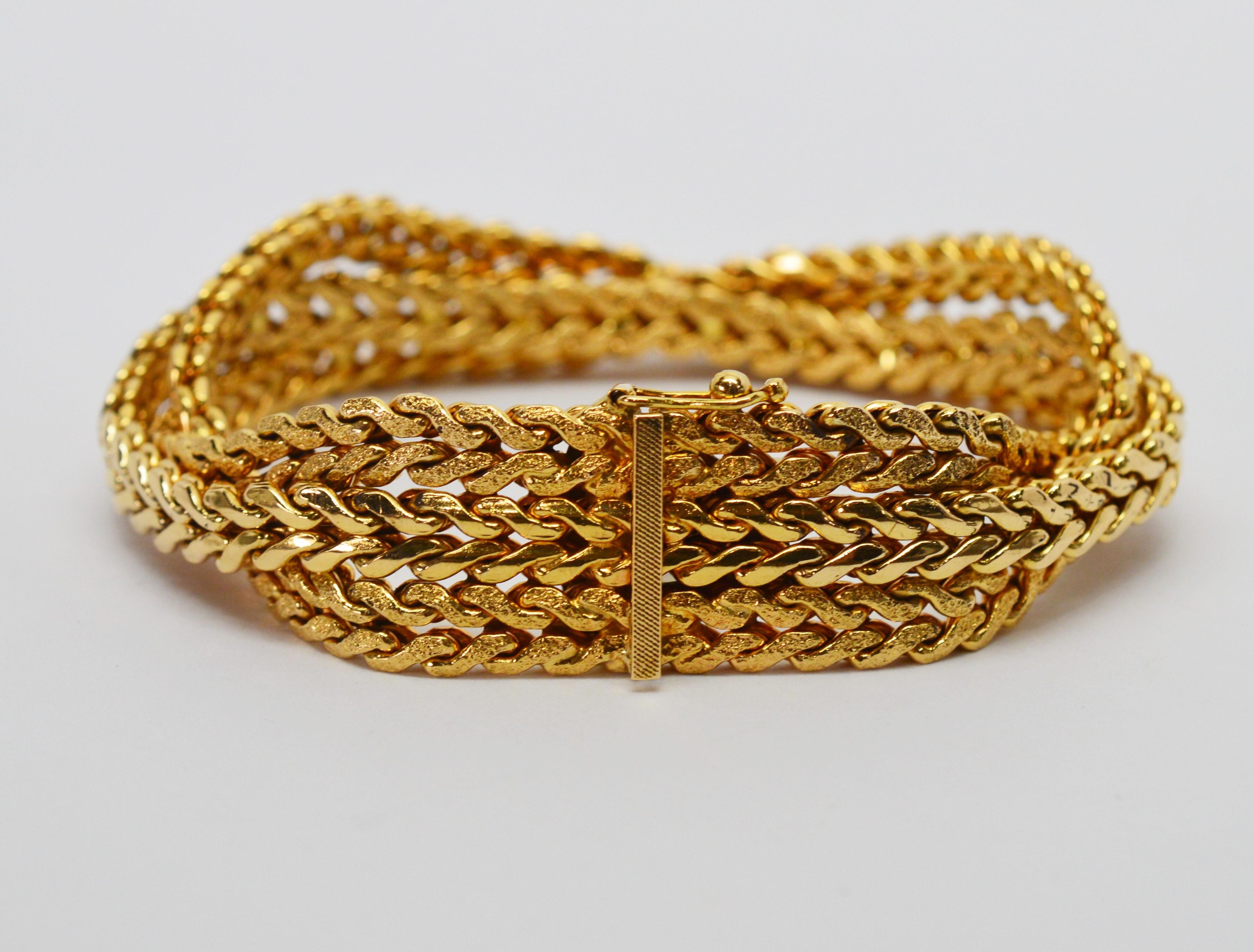 Love this look! Wrap your wrist in multiple lengths of satin and bright eighteen carat 18K yellow gold herringbone chain braided and displaying the stylish look of casual elegance.  Offering comfort thru flexibility, this quality Italian made