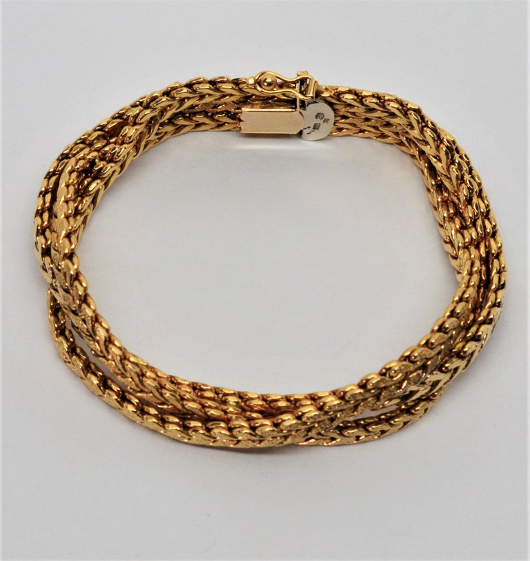Yellow Gold Braided Herringbone Chain Bracelet For Sale at 1stdibs