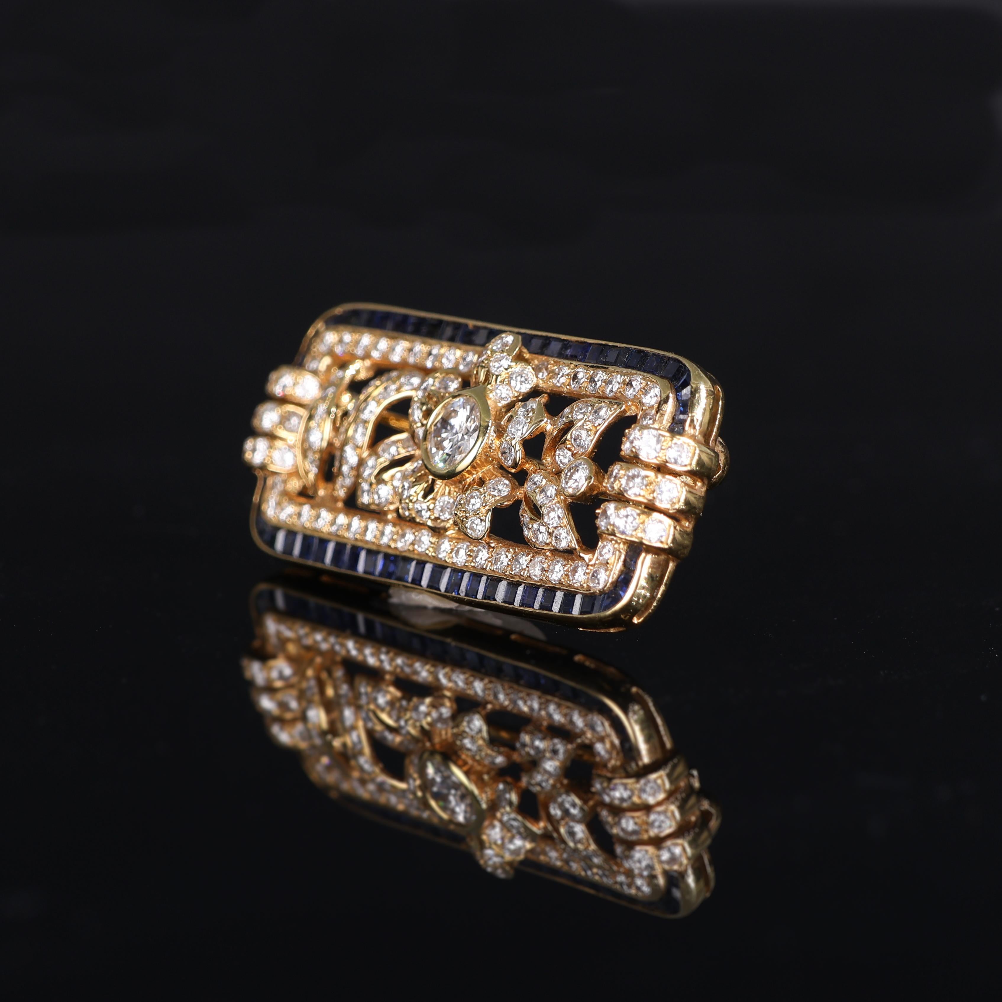 IMPORTANT NOTE:
✔ No additional costs will be added to this order.
✔ Shipping and customs duties are fully covered by us.
--------------------
A refined rectangular brooch crafted in 18K yellow gold, featuring an intricate floral design adorned with