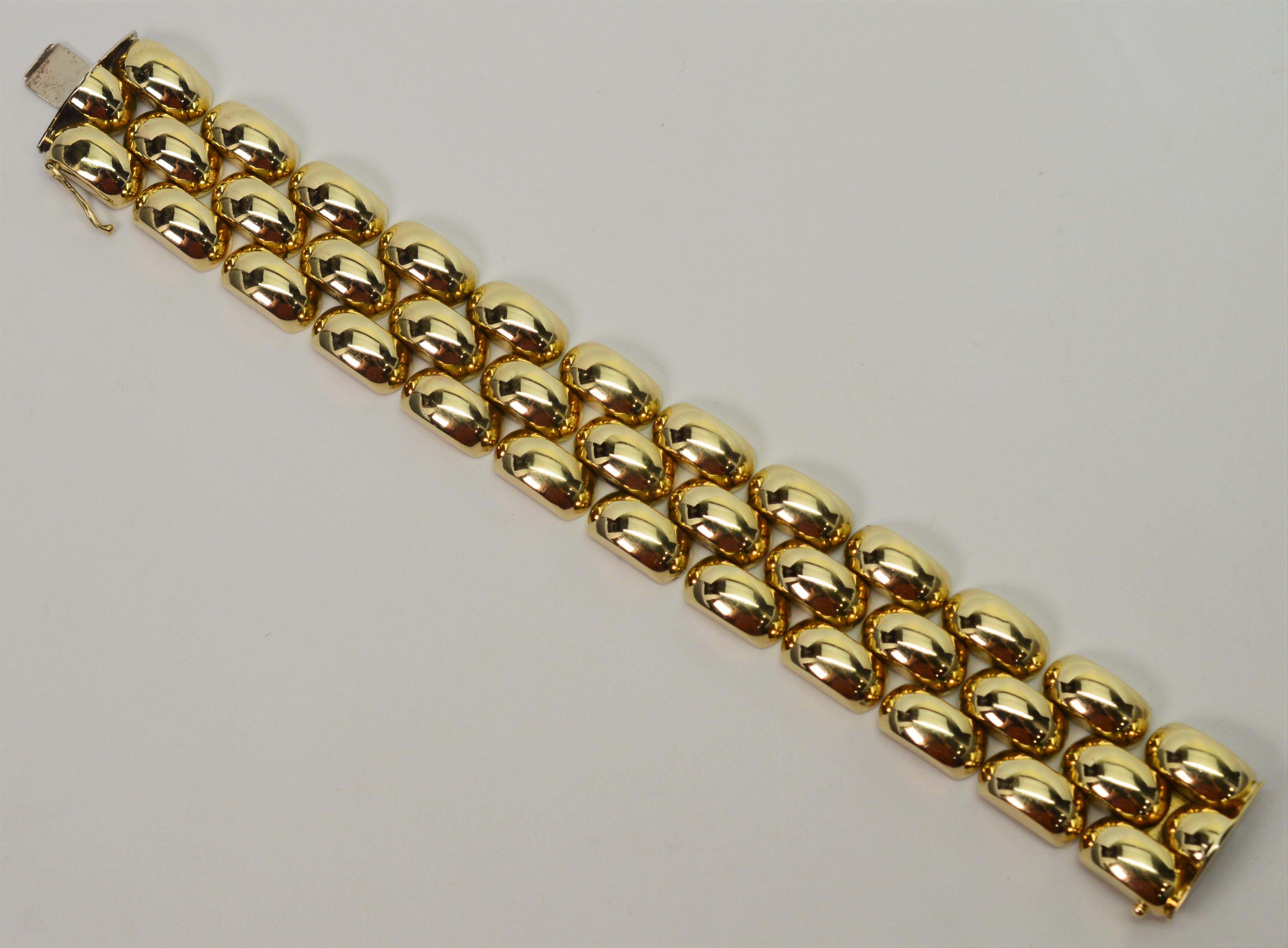 Make a stylish gold statement with this exquisite retro bracelet. In the style of the 1950 to early 1960's, this substantial fourteen carat 14K Italian gold bracelet is made of distinctive bubble links hinged in an interesting alternating pattern