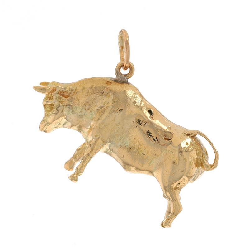 Metal Content: 14k Yellow Gold

Theme: Bull, Cattle, Bovine

Measurements

Tall (from stationary bail): 1 1/32