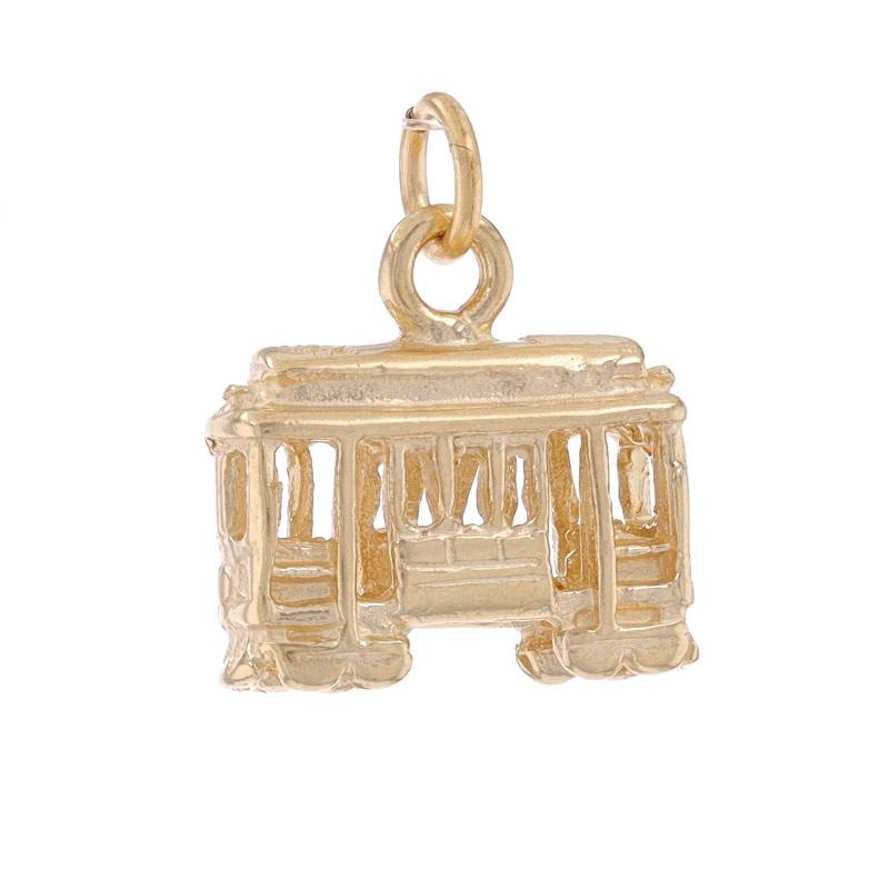 Metal Content: 14k Yellow Gold

Theme: Cable Car, Trolley, Transportation
Features: Open Cut Design

Measurements

Tall (from stationary bail): 9/16