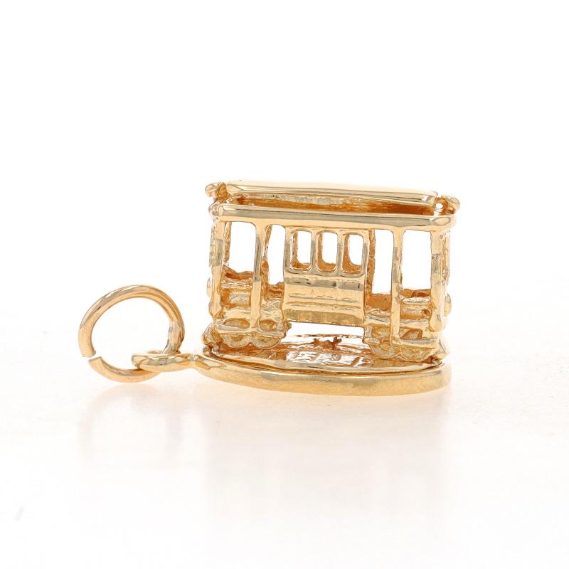 Metal Content: 14k Yellow Gold

Theme: Cable Car, Trolley
Features: The charm rotates on the round base.

Measurements
Tall (from stationary bail): 3/4