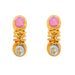 Orecchini con gemme cabochon in oro giallo