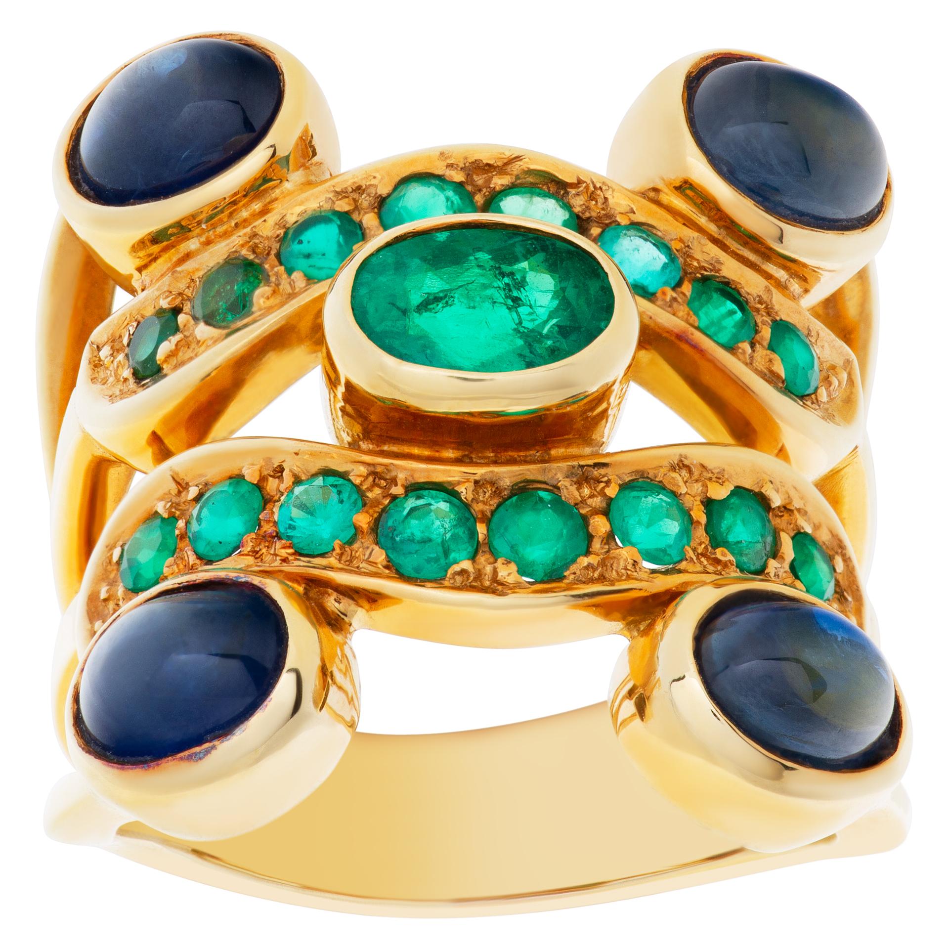 Yellow gold cabochon sapphires and emerald ring