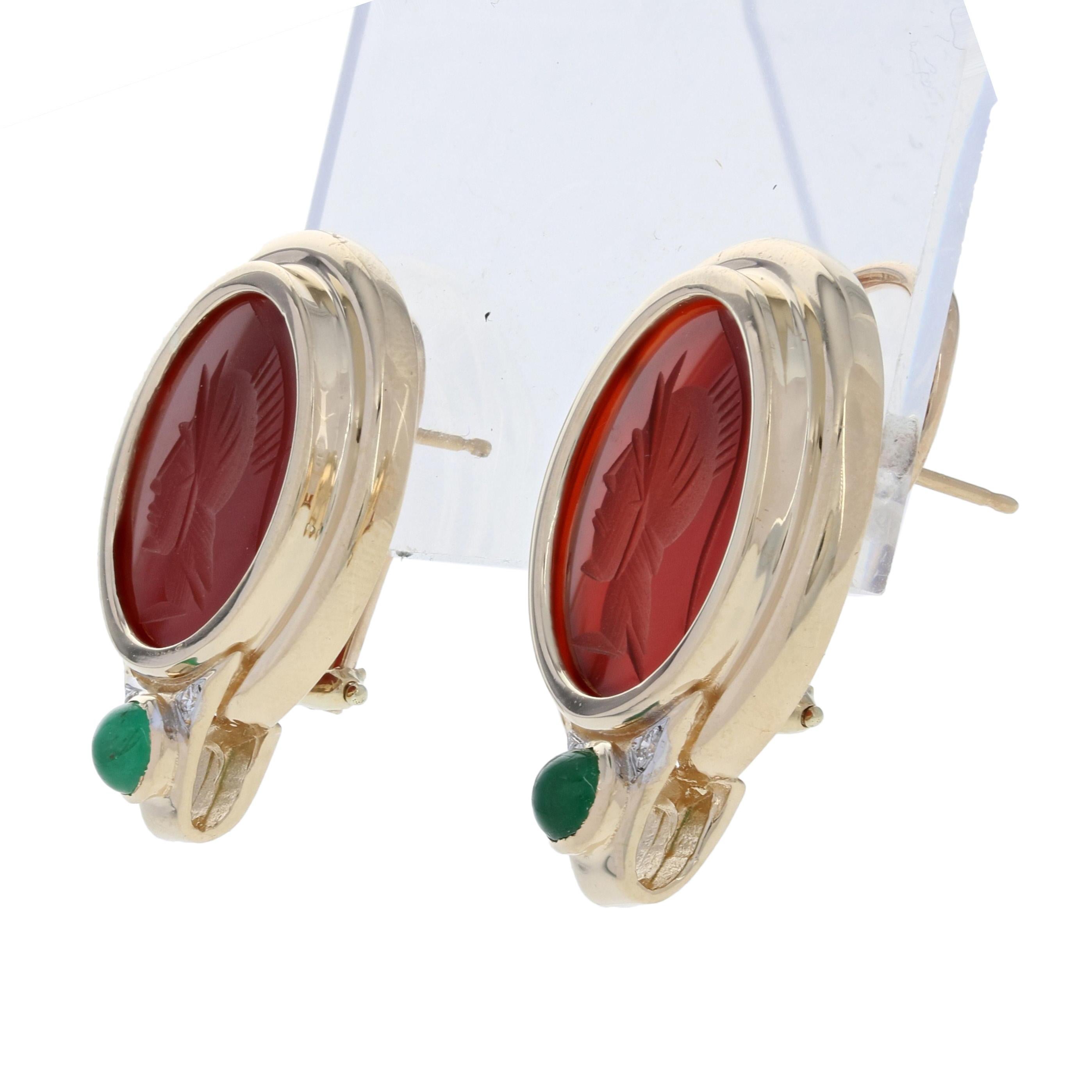 Metal Content: Guaranteed 14k Gold as stamped (yellow and white)

Stone Information: 
Genuine Carnelian 
Color: Red

Genuine Emeralds
Treatment: Oiling
Color: Green
Cut: Round Cabochon
Carats: 0.40ctw

Natural Diamonds
Clarity: SI1
Color: G - H
Cut: