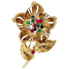 Yellow Gold Cartier Flower Brooch, Diamonds, Emerald, Rubies and Sapphires