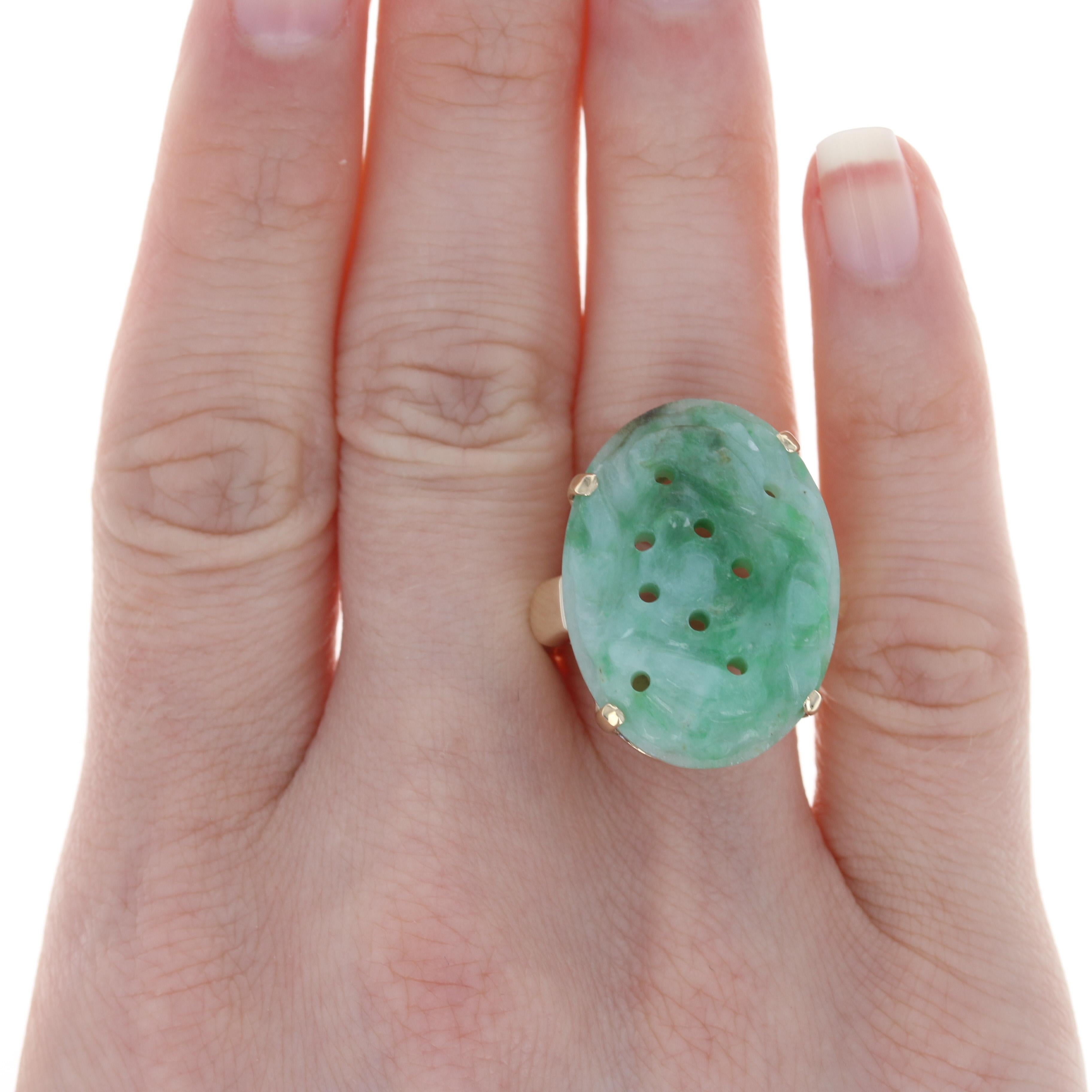 Size: 8 1/4
 Sizing Fee: Can be re-sized up 2 sizes for $35 or down 1 size for $30
 
 Metal Content: 14k Yellow Gold
 
 Stone Information: 
 Genuine Carved Jadeite
 Treatment: Routinely Enhanced
 Colors: Green & White
 Size: 26.7mm x 19.7mm
 

