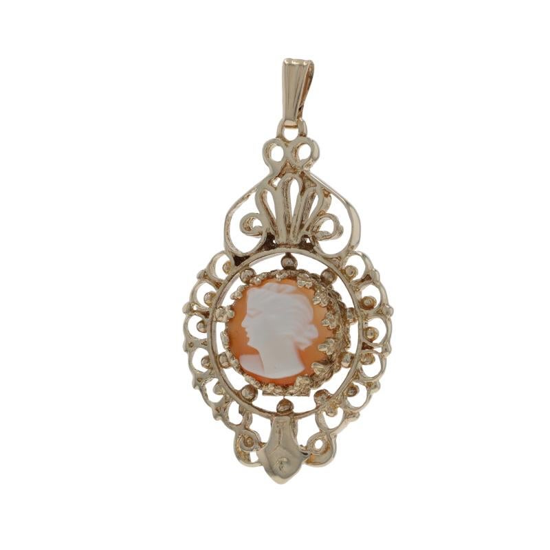 Era: Vintage

Metal Content: 14k Yellow Gold

Stone Information

Carved Shell Cameo

Theme: Silhouette

Measurements

Tall (from stationary bail): 1 1/8